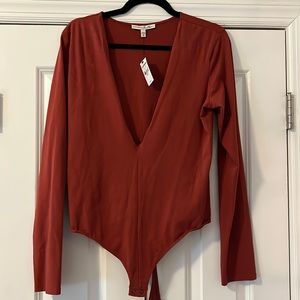 Never worn Express, deep V bodysuit